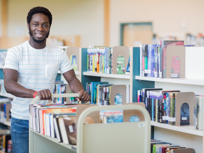 library volunteer shelving