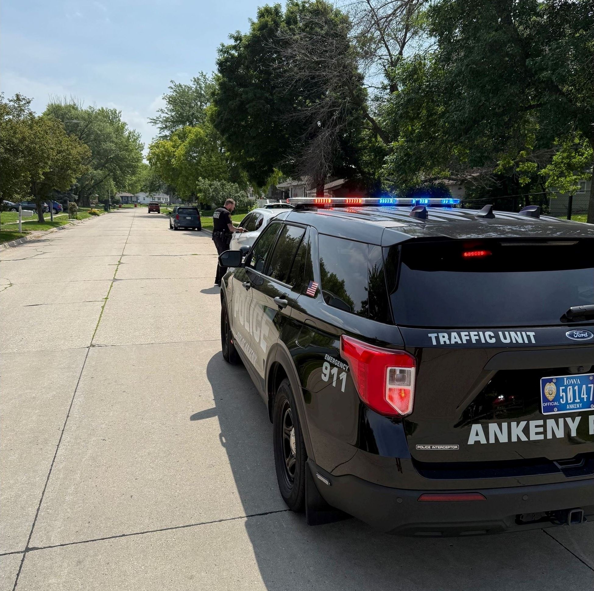 Ankeny Traffic Unit Vehicle with Officer talking to motorist who has been pulled over